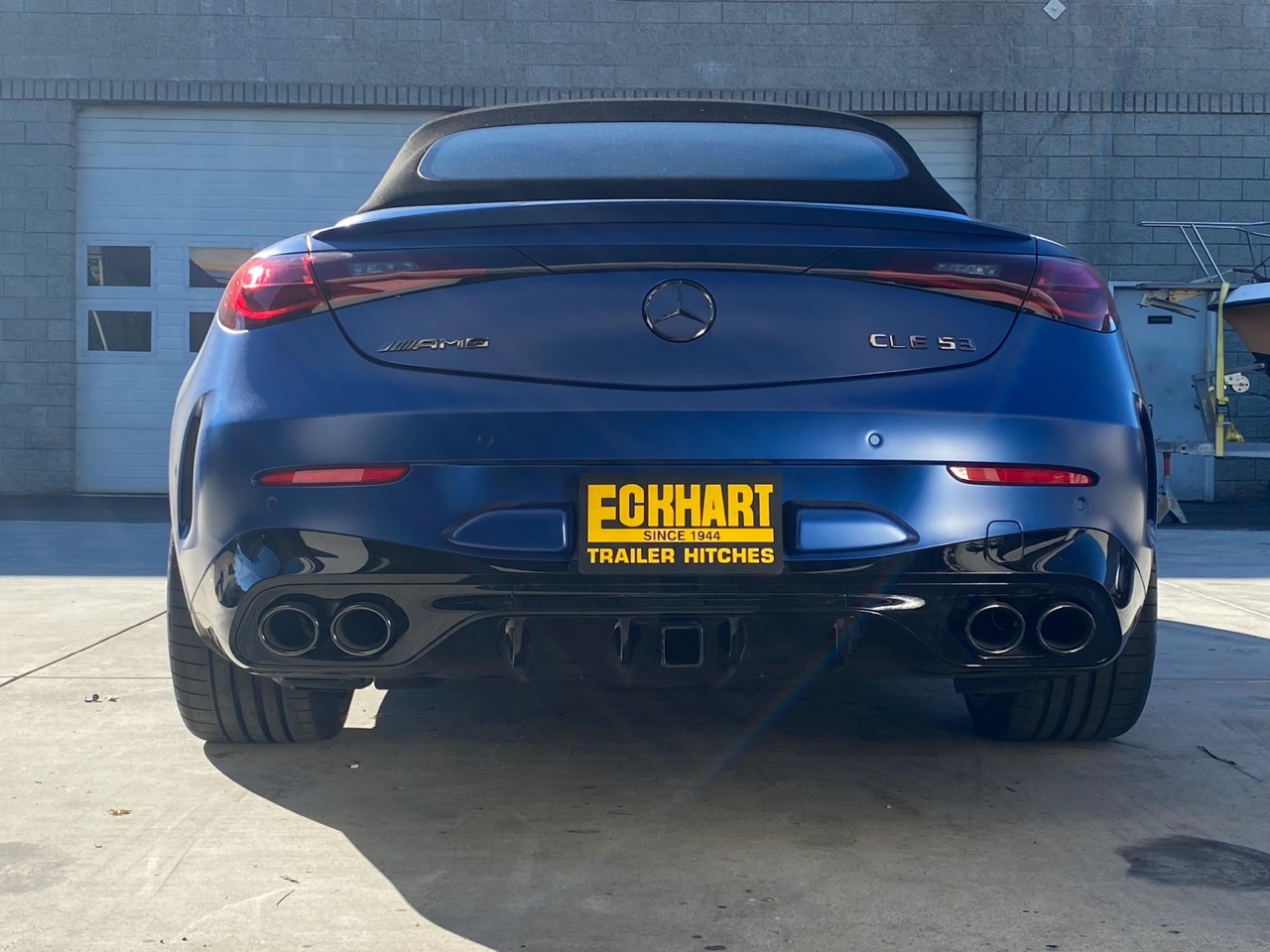 Custom hidden trailer hitch installed on a Mercedes CLE53 by the Eckharts welding team in Thousand Oaks, CA.
