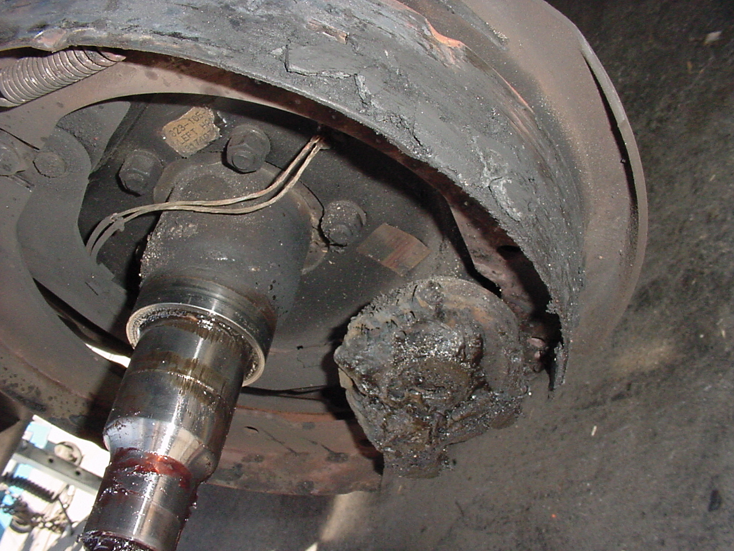 Burnt and damaged trailer brakes being replaced as part of Eckharts comprehensive trailer repair and maintenance services.