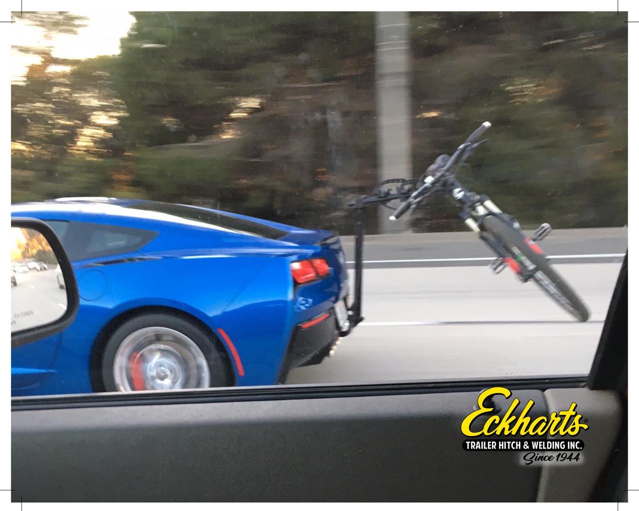 Chevrolet Corvette C7 utilizing a custom Hidden Look hitch to carry a bike rack.