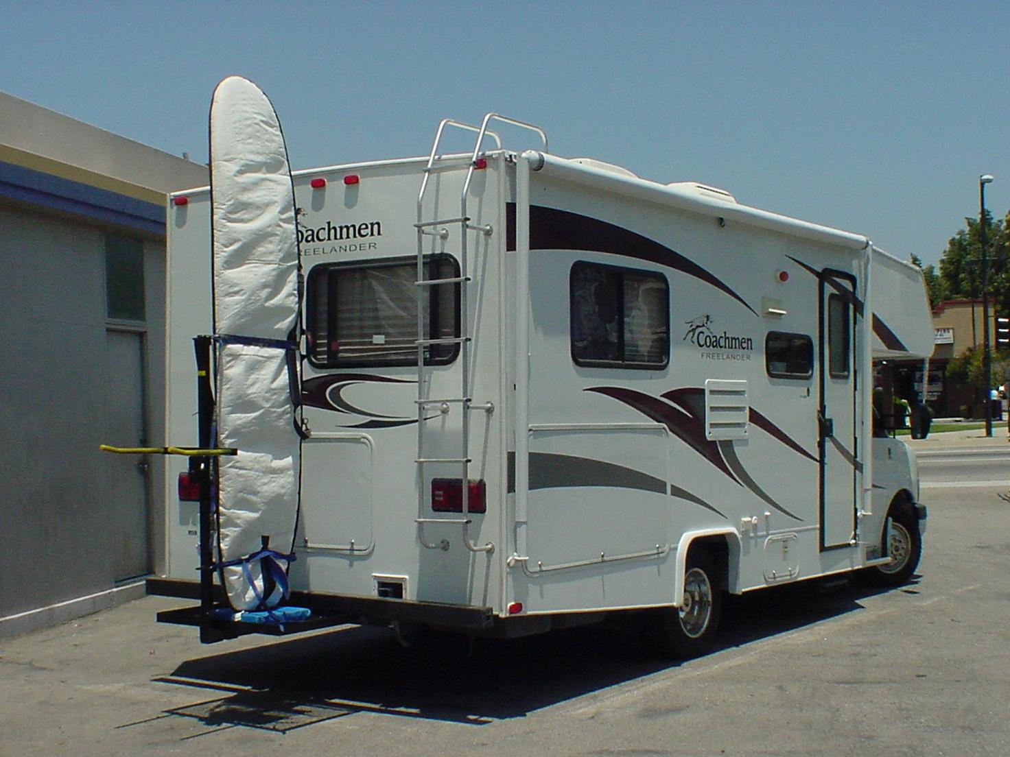 Custom-fabricated vehicle rack designed for securely transporting surfboards.