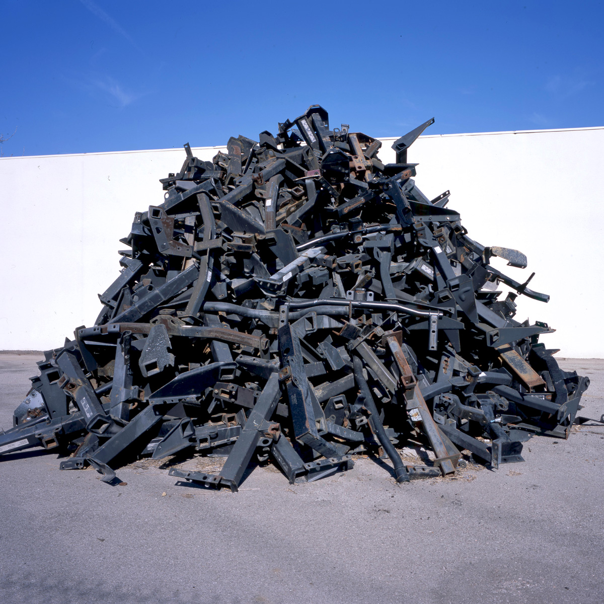 A pile of broken, low-quality competitor trailer hitches replaced by Eckharts.