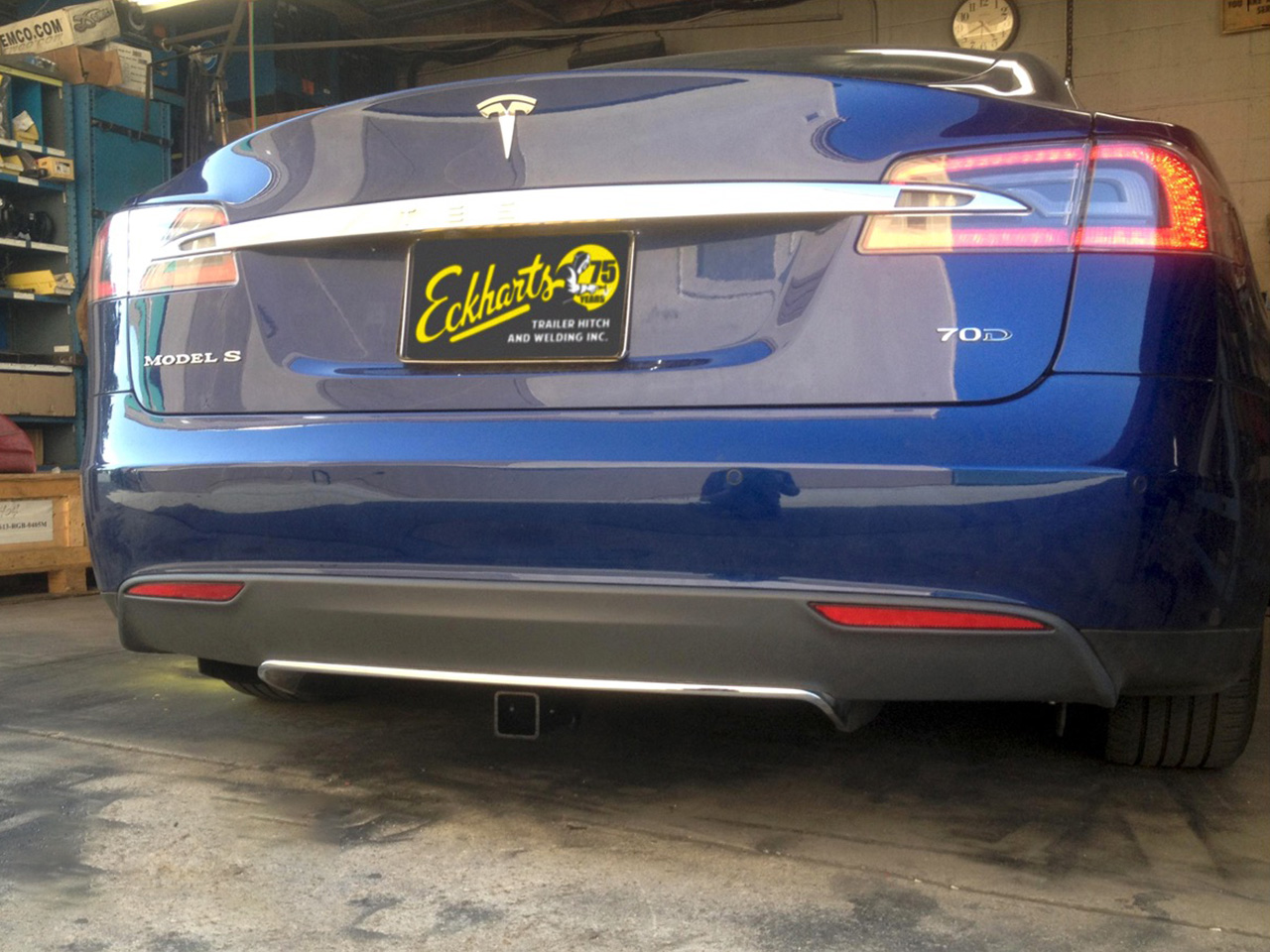 Custom hidden trailer hitch installed on a Tesla Model S by the Eckharts welding team in Thousand Oaks, CA.